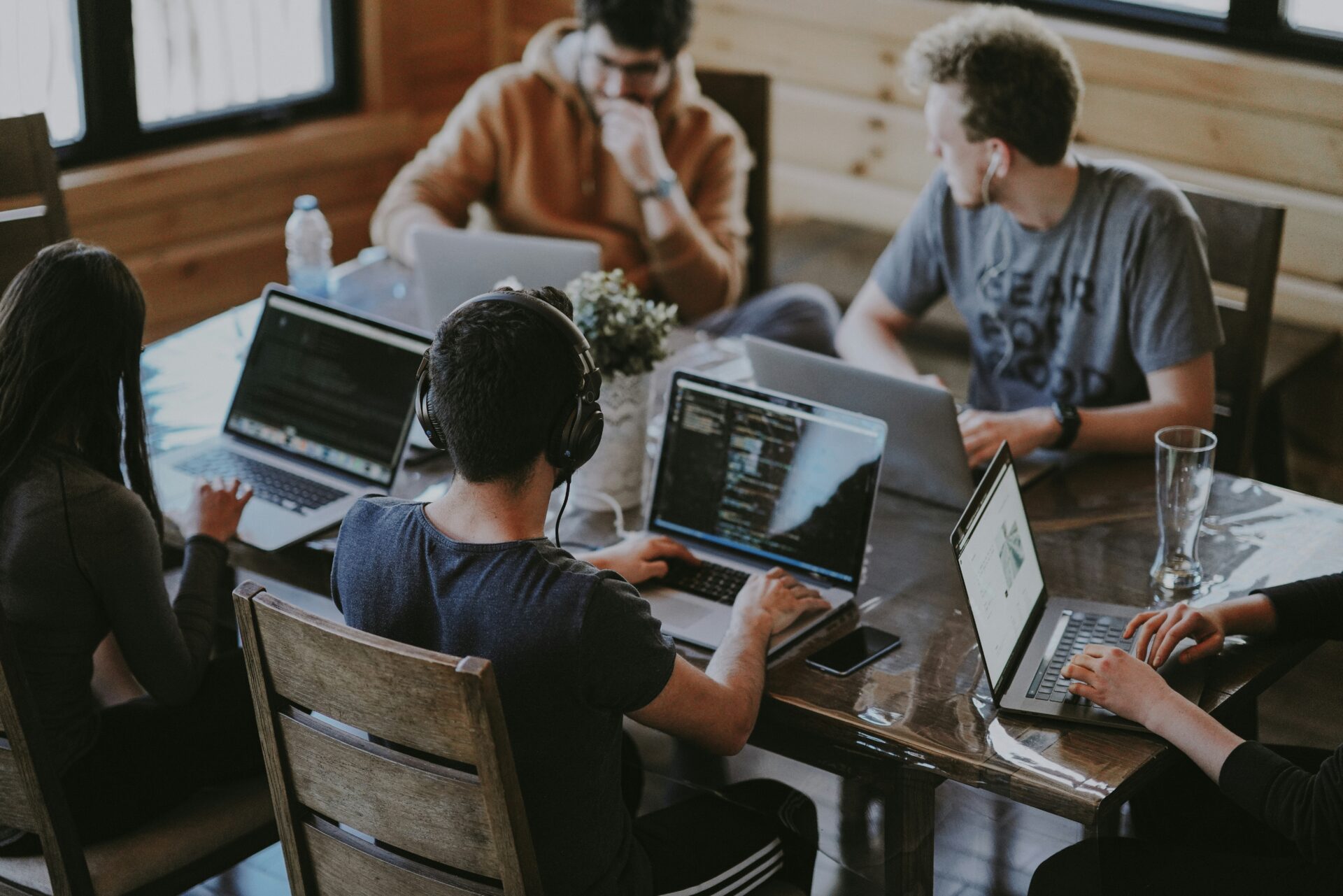 A group of people on laptops during a working session